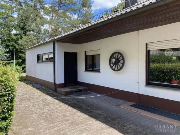 Immobilie in Hochspeyer - Ein Anwesen für Pferdeliebhaber - Einfamilienhaus mit Einliegerwohnung und Stallungen mit Scheune - Bild 1