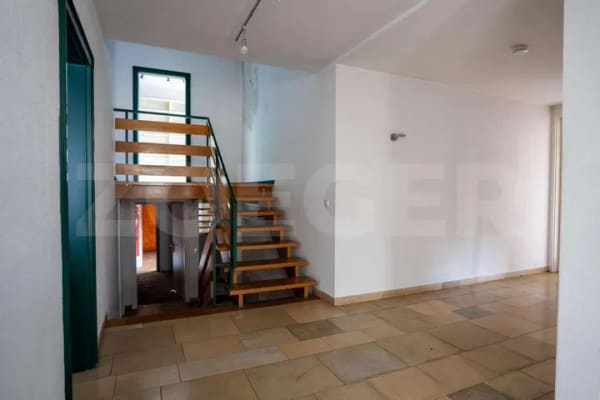 Immobilie in Hamm - Vielseitiger Bungalow mit Kaminzimmer, Garage und  sonnigem Südwestgarten auf Erbbaugrundstück - Bild 1