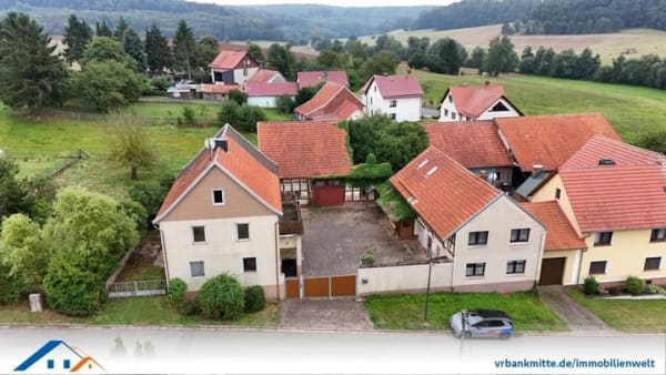 Immobilie in Sonnenstein - Einfamilienhaus mit ehemaligem landwirtschaftlichem Hofensemble, Scheune und Garagen - Bild 1