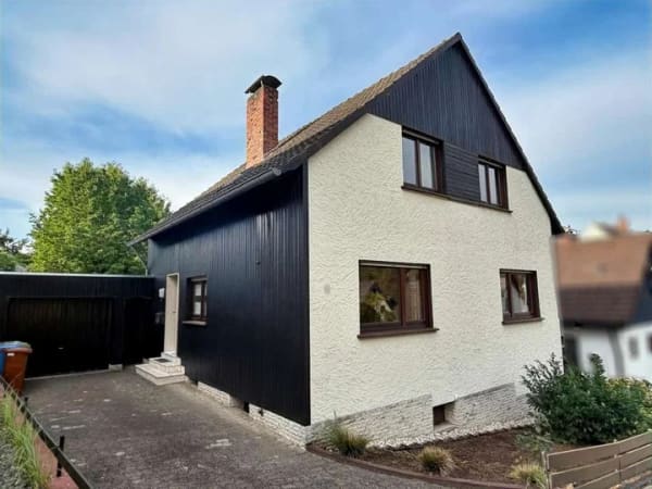 Immobilie in Niederbreitbach - Familienfreundliches Haus mit eingefriedetem Garten und Garage - Bild 2