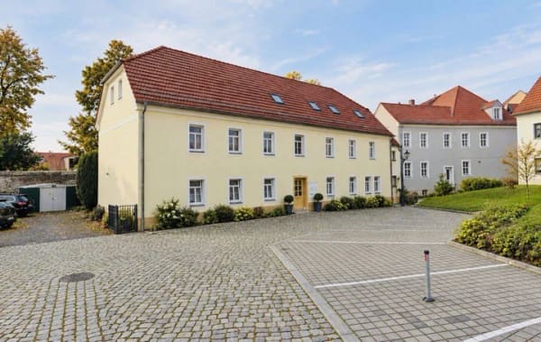 Immobilie in Großenhain - Innenstadtlage mit Entwicklungspotential - Mehrfamilienhaus mit Sanierungsbedarf in Großenhain - Bild 0