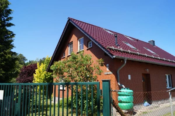 Immobilie in Rauen - Charmantes Einfamilienhaus mit großzügigem Nebengelass in ländlicher Idylle in Rauen! - Bild 1