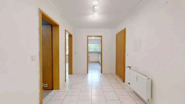 Immobilie in Winnweiler - 2-Zimmer-Wohnung mit Südwestbalkon & Garage - Bild 3