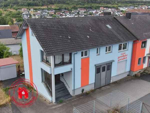 Immobilie in Höpfingen - Großzügiges Einfamilienhaus mit Lagerflächen in Höpfingen - inkl. separatem Baugrundstück! - Bild 0