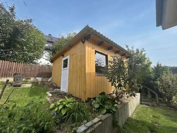 Immobilie in Kirchhundem - Großzügiges Mehrfamilienhaus mit Garage und attraktiven Nutzungsmöglichkeiten in Kirchhundem - Bild 3