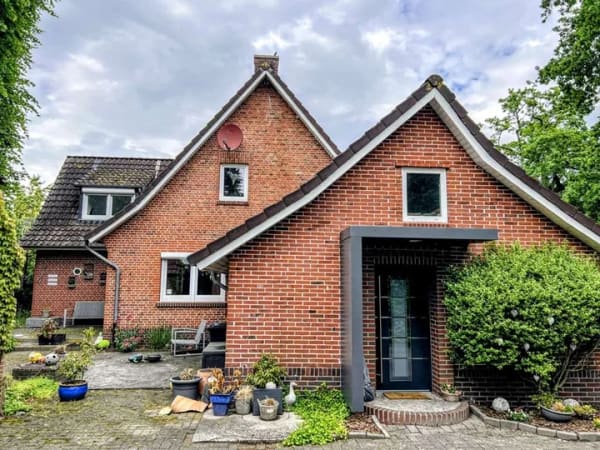 Immobilie in Filsum - Lebensraum trifft Schraubertraum - Einfamilienhaus mit Halle! - Bild 1
