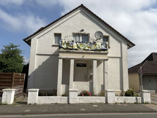Immobilie in Ibbenbüren - Charmantes Zweifamilienhaus mit Potenzial in Ibbenbüren-Laggenbeck zu verkaufen! - Bild 0
