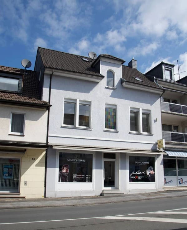 Immobilie in Haan - Großzügiges Wohnhaus in Haan mit Garten, Wintergarten, Garage und vermieteter Gewerbeeinheit - Bild 0