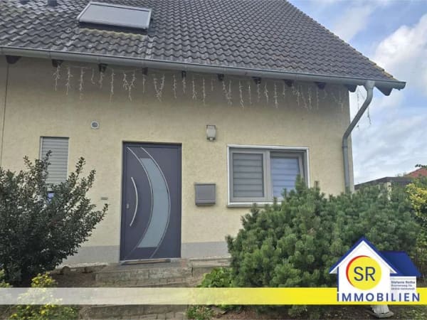 Immobilie in Wefensleben - Gepflegte DHH mit Garten, Garage und Stellplatz - Bild 0