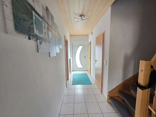 Immobilie in Wefensleben - Gepflegte DHH mit Garten, Garage und Stellplatz - Bild 1
