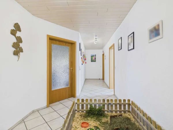 Immobilie in Bollingstedt - Gepflegtes Zweifamilienhaus in Gammellund – zwei vermietete Wohneinheiten mit eigenem Zugang - Bild 3