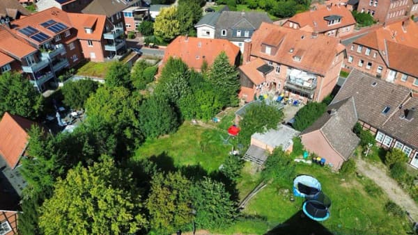 Immobilie in Ebstorf - Entwicklungsstarkes Mehrfamilienhaus mit sieben Wohneinheiten und zusätzlichem Bebauungspotenzial - Bild 4