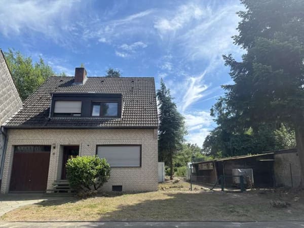 Immobilie in Erkelenz - Erkelenz-Unterwestrich ! solides Familienhaus mit integrierter Garage und großem Süd-Grundstück - Bild 1