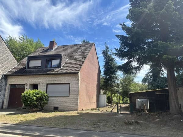 Immobilie in Erkelenz - Erkelenz-Unterwestrich ! solides Familienhaus mit integrierter Garage und großem Süd-Grundstück - Bild 2