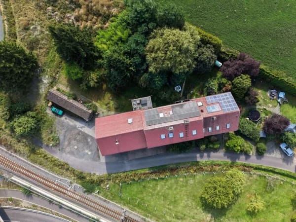 Immobilie in Lahntal - Attraktive Kapitalanlage mit 3 vermieteten Wohneinheiten, Wärmepumpe & Photovoltaik - Bild 1