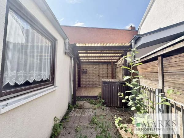 Immobilie in Lübeck - Doppelhaushälfte in Lübeck Sankt-Lorenz-Süd auf Eigenland - Sanierungsbedürftig - Bild 2