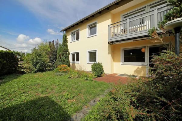 Immobilie in Grasbrunn - Ein Haus, viele Möglichkeiten,  Zweifamilienhaus mit großzügigem Garten - Bild 2