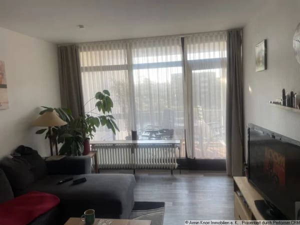Immobilie in Bad Zwischenahn - Verkauf! OG-Wohnung direkt am Zwischenahner Meer mit Blick auf den Yachthafen– Renovierungsbedürftig! - Bild 1