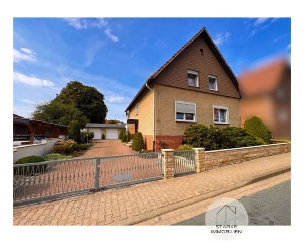 Immobilie in Salzhemmendorf - Einfamilienhaus mit großem Garten/Dachterrasse/Doppelgarage zentral in Salzhemmendorf - Bild 1
