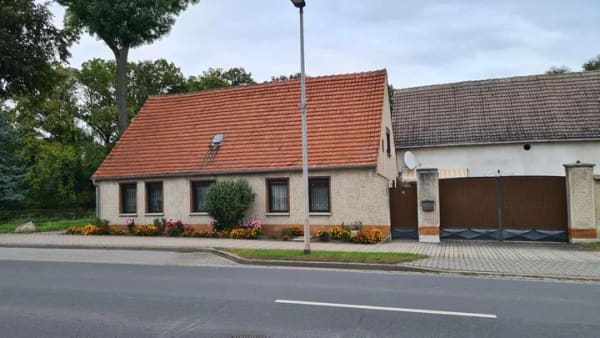 Immobilie in Möckern - Wohnhaus mit Einliegerwohnung direkt am Wasser - Bild 1