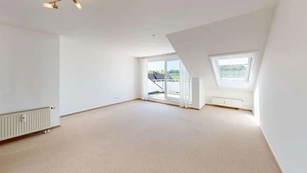 Immobilie in Renningen - Helle 2-Zimmer-Dachgeschosswohnung mit Loggia in ruhiger Lage von Renningen-Malmsheim - Bild 2