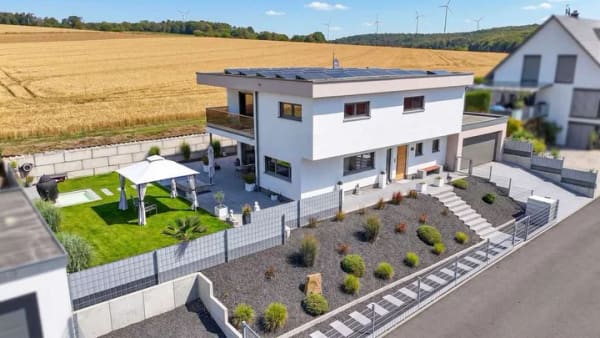 Immobilie in Erlenbach b.Marktheidenfeld - Wo modernes Wohnen auf Natur trifft – außergewöhnliches Einfamilienhaus mit Wohlfühlgarantie - Bild 0