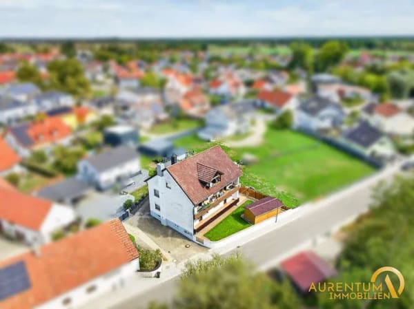 Immobilie in Baar-Ebenhausen - Großzügige Hochparterrewohnung mit Balkon, Terrasse, Garage und eigenem Gartenbereich - Bild 1