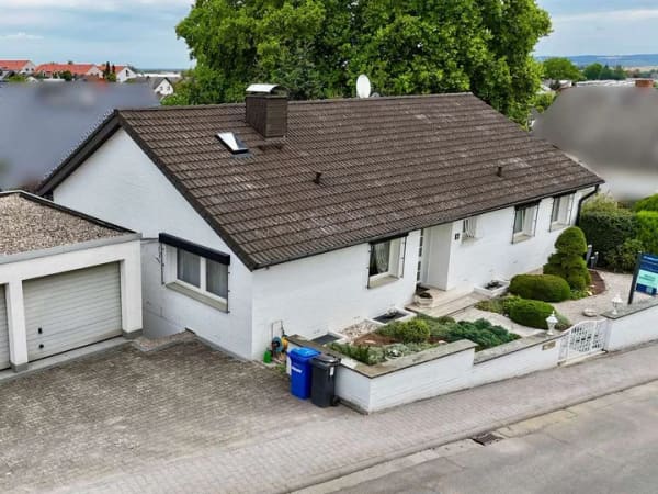 Immobilie in Reinheim - Außergewöhnlicher Bungalow mit repräsentativen Wohnbereichen und gepflegter Außenanlage - Bild 0