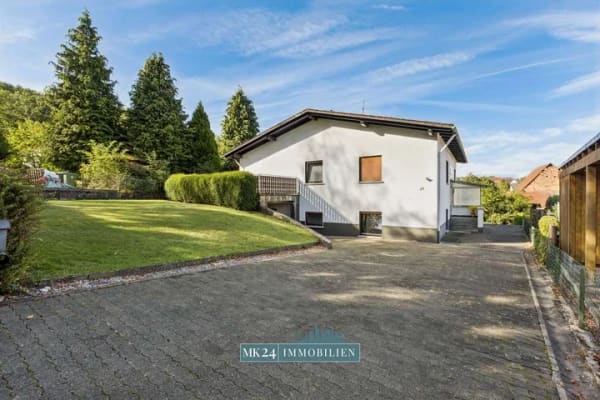 Immobilie in Biebertal - Familienglück mit Potenzial – Großzügiges Einfamilienhaus mit Garten in ruhiger Lage - Bild 0