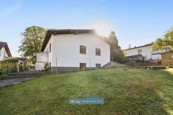 Immobilie in Biebertal - Familienglück mit Potenzial – Großzügiges Einfamilienhaus mit Garten in ruhiger Lage - Bild 2