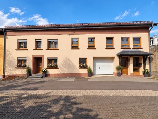 Immobilie in Mettlach - Zwei Immobilien in einer – vielseitiges Wohnkonzept in Mettlach-Orscholz - Bild 0