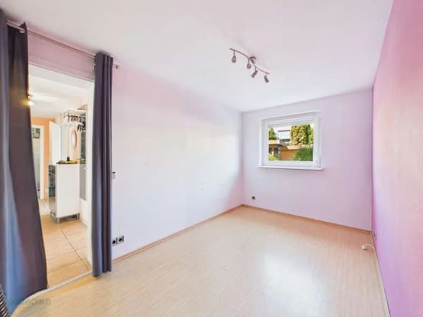 Immobilie in Großbettlingen - Gepflegtes Zweifamilienhaus mit Garten, Balkonen und Platz | Großbettlingen - Bild 4