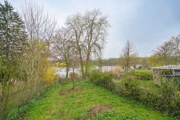 Immobilie in Schönberg - Vermietetes Mehrfamilienhaus mit 6 Einheiten direkt am Oberteich - Bild 3