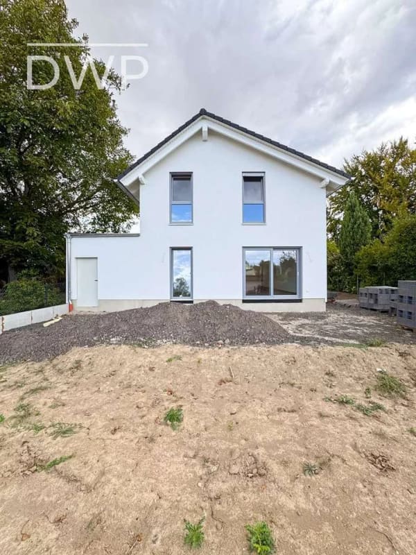 Immobilie in Bechtolsheim - Sofort einziehen & wohlfühlen: Hochwertiges KFW 55 "Nordhaus" mit exklusiver Ausstattung am Feldrand - Bild 1