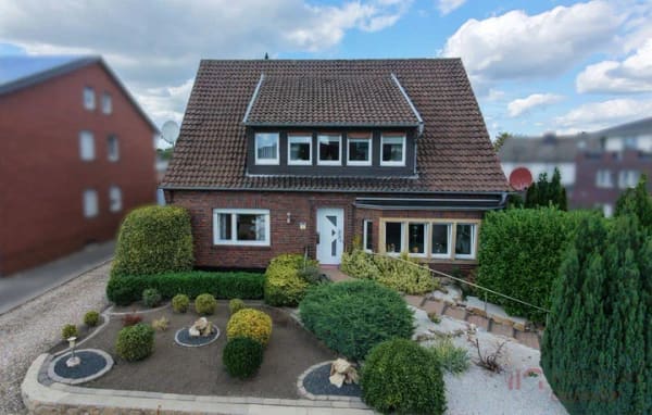 Immobilie in Salzbergen - IMMOBILIEN GUMNIOR präsentiert: Charmante Erdgeschosswohnung mit Garten und Terrasse in zentraler Lage von Salzbergen - Bild 0