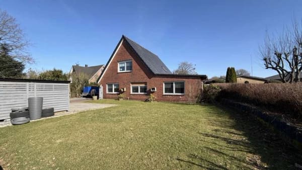 Immobilie in Lohe-Föhrden - Großzügiges Einfamilienhaus mit Wintergarten in Lohe-Föhrden - Bild 1