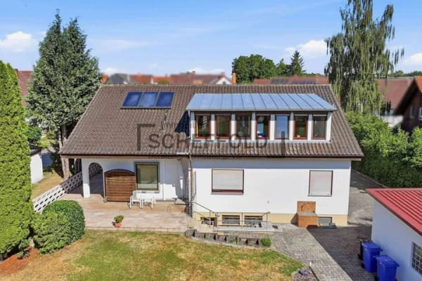 Immobilie in Mietingen - Ankommen! Gemütliche 4,5-Zimmer Dachgeschosswohnung mit Garage in ruhiger Wohnlage - Bild 2