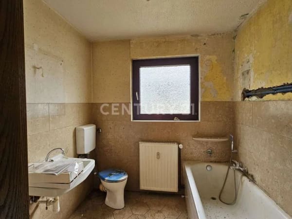 Immobilie in Hemer - Attraktive Kapitalanlage mit Potenzial: Mehrfamilienhaus mit 6 Eigentumswohnungen & Garagen in Hemer - Bild 3