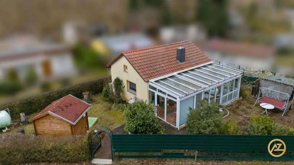 Immobilie in Wolmirstedt - „Bungalow am Jersleber See: ganzjährig wohnen mit Kamin, Wintergarten & Klimaanlage“ - Bild 0