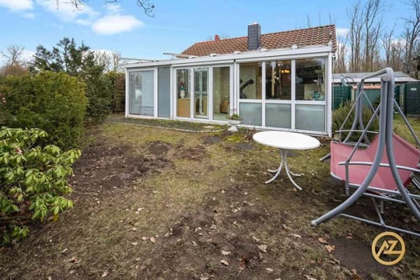 Immobilie in Wolmirstedt - „Bungalow am Jersleber See: ganzjährig wohnen mit Kamin, Wintergarten & Klimaanlage“ - Bild 1