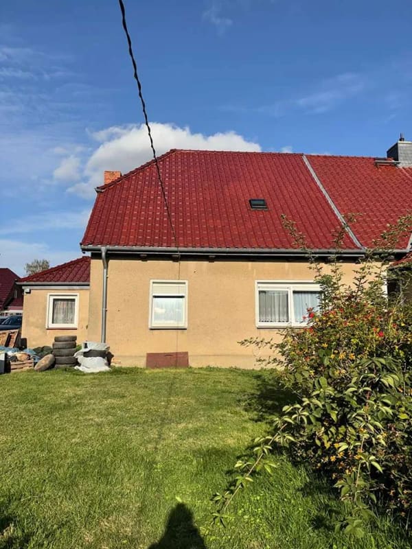 Immobilie in Dummerstorf - renovierungsbedürftige Doppelhaushälfte mit ca. 1.177 m² Grundstück, Stall und Garage - Bild 1