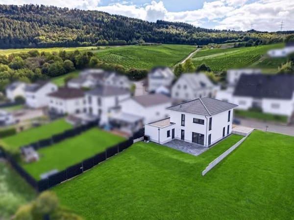 Immobilie in Riol - RIOL: Neubau mit Weitblick – modernes Einfamilienhaus auf großzügigem Grundstück - Bild 3