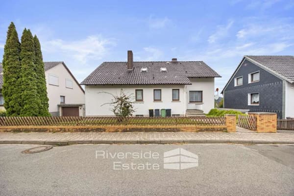 Immobilie in Bodenwerder - Bodenwerder | Sanierungsbedürftiges Einfamilienhaus mit Garten, Garage & Weitblick! - Bild 1