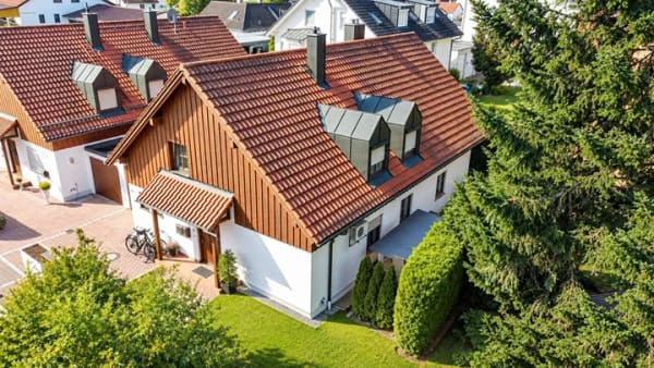 Immobilie in Puchheim - vermietetes Einfamilienhaus mit 2 Wohneinheiten zu verkaufen - Bild 1