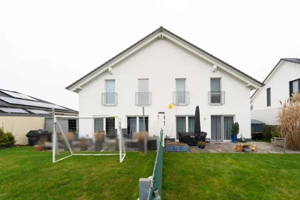 Immobilie in Grolsheim - Moderne vermietete Doppelhaushälfte mit Garten und effizienter Haustechnik in Grolsheim - Bild 0