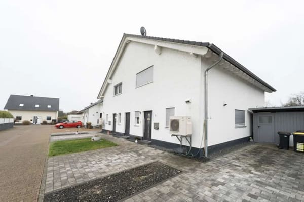 Immobilie in Grolsheim - Moderne vermietete Doppelhaushälfte mit Garten und effizienter Haustechnik in Grolsheim - Bild 1