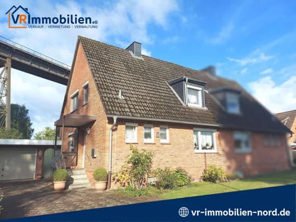 Immobilie in Osterrönfeld - Gepflegte Doppelhaushälfte mit familienfreundlichem Grundriss und schönem Garten - Bild 0