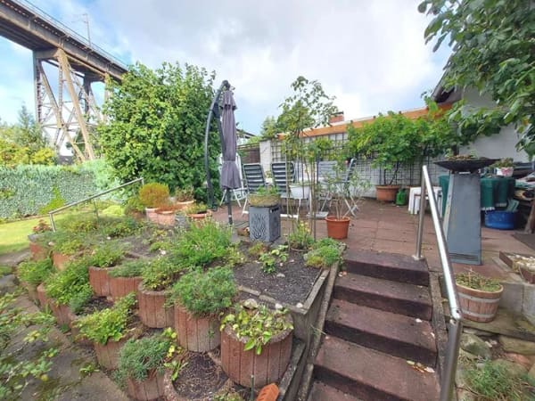 Immobilie in Osterrönfeld - Gepflegte Doppelhaushälfte mit familienfreundlichem Grundriss und schönem Garten - Bild 2