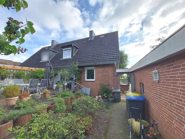 Immobilie in Osterrönfeld - Gepflegte Doppelhaushälfte mit familienfreundlichem Grundriss und schönem Garten - Bild 4