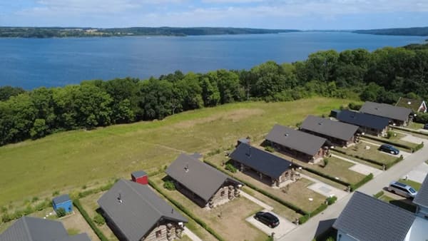 Immobilie in Groß Nemerow - Etablierte Ferienanlage am Tollensesee - Natur, Ruhe und Rendite in der Mecklenburgischen Seenplatte - 8 Stück Exklusive Naturstammhäusern in naturnah - Bild 0